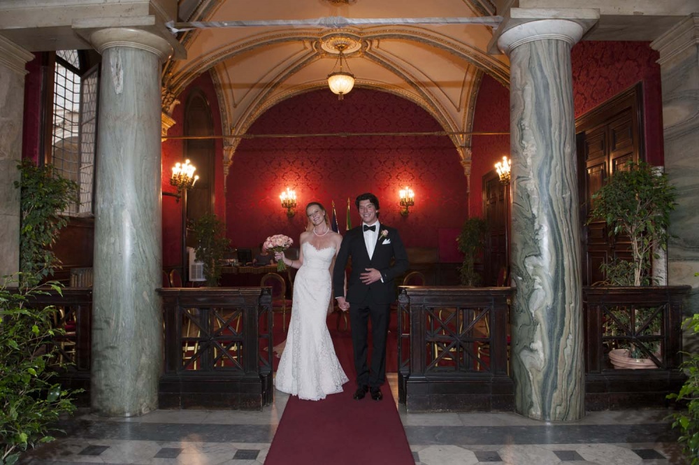 Bride and groom just married at the exit from the Red Hall in Campidoglio Rome