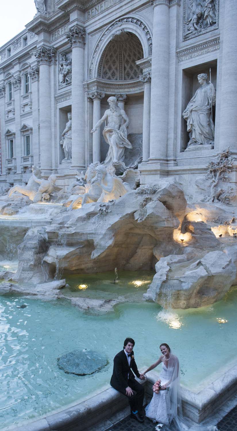 newly married couple romantic portrait at Fontana di Trevi in Rome