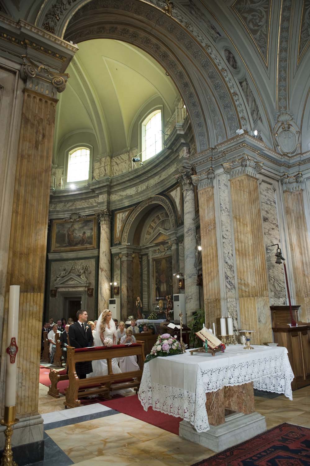 Catholic wedding ceremony in a baroque church in Vatican Rome