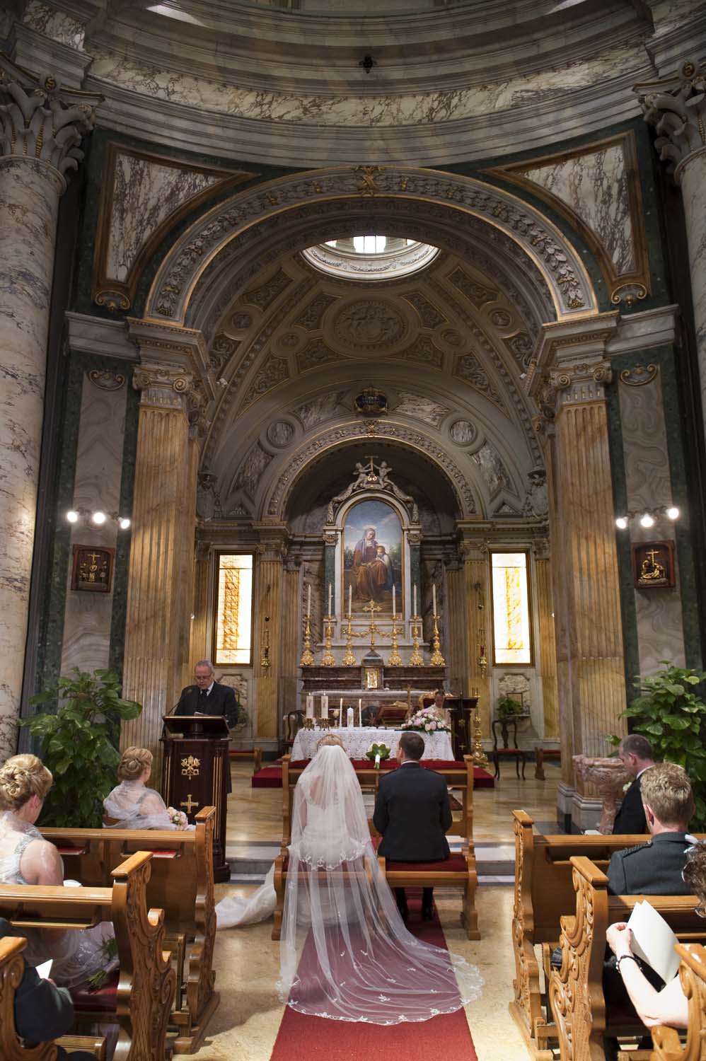 View of the bride and groom with the altar