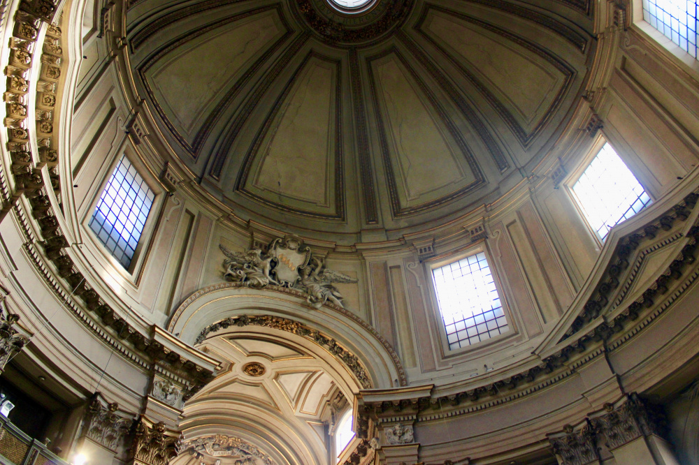 detail of the dome's windows that bring special misty light to the wedding church in rome