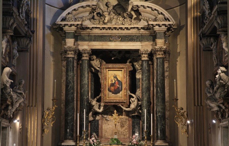 deatail of the altar were st mary of miracles's icon is displayed in catolic wedding church rome