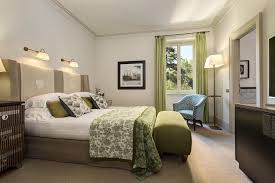 Bedroom with green details in an hotel in Rome for wedding guests