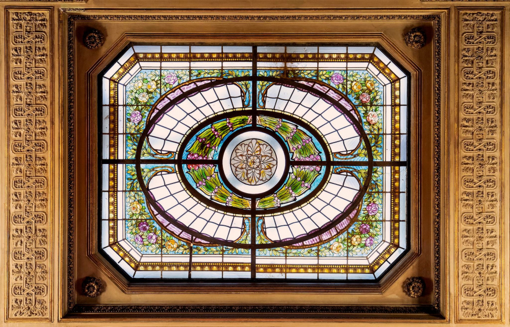 detail of a liberty style stained glass roof window