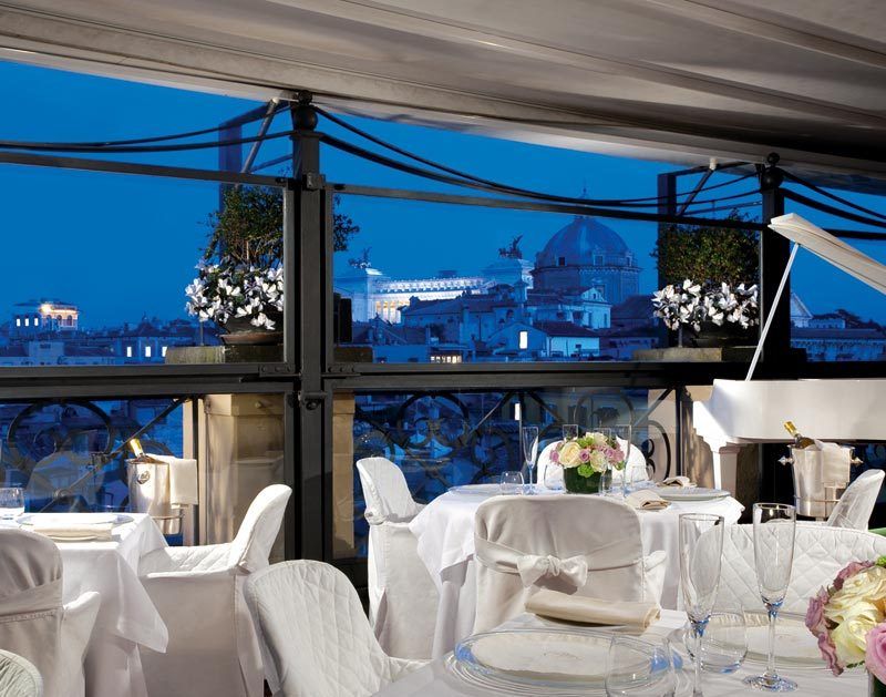 dinner in luxury wedding restaurant with fantastic view over main monuments in Rome