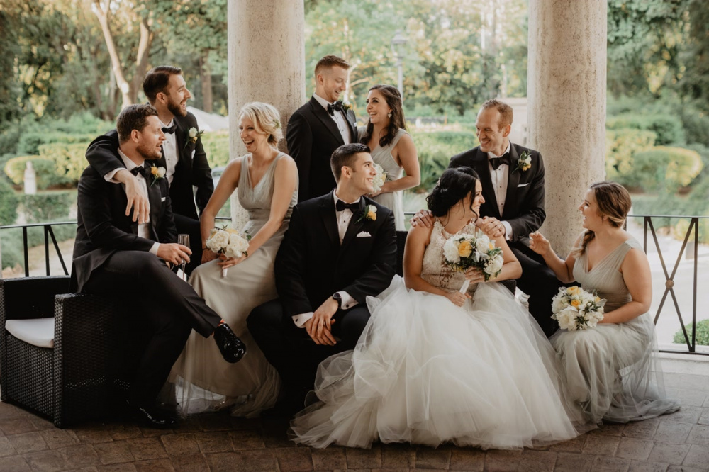 Bride, groom, groomsmen and bridemaids in a portrait