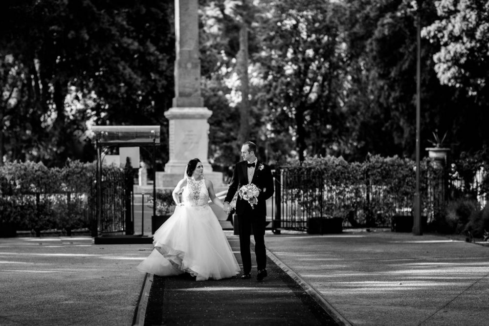 bride and groom at the entrance of the wedding venue