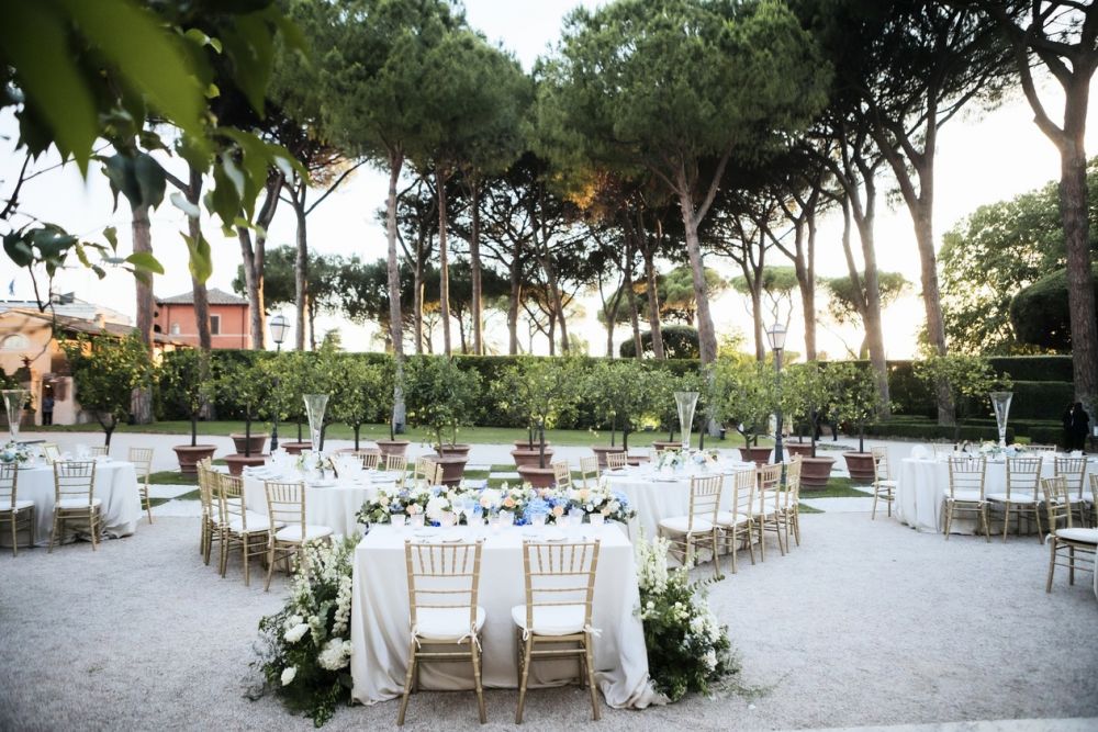 Tables in the garden of the wedding villa in Rome