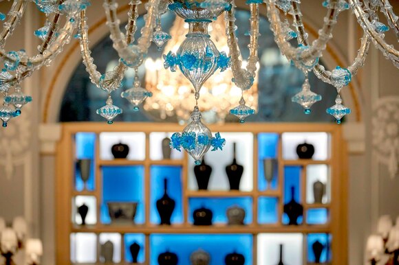 detail of the impressive murano glass with fine decorations in blu colour